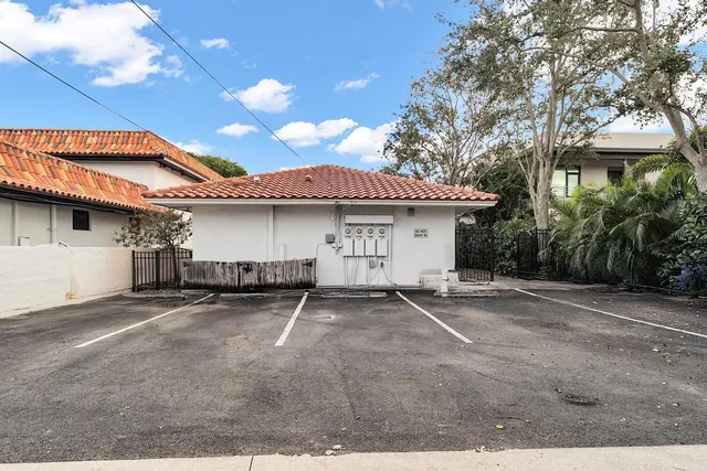 an aerial view of a building with outdoor space