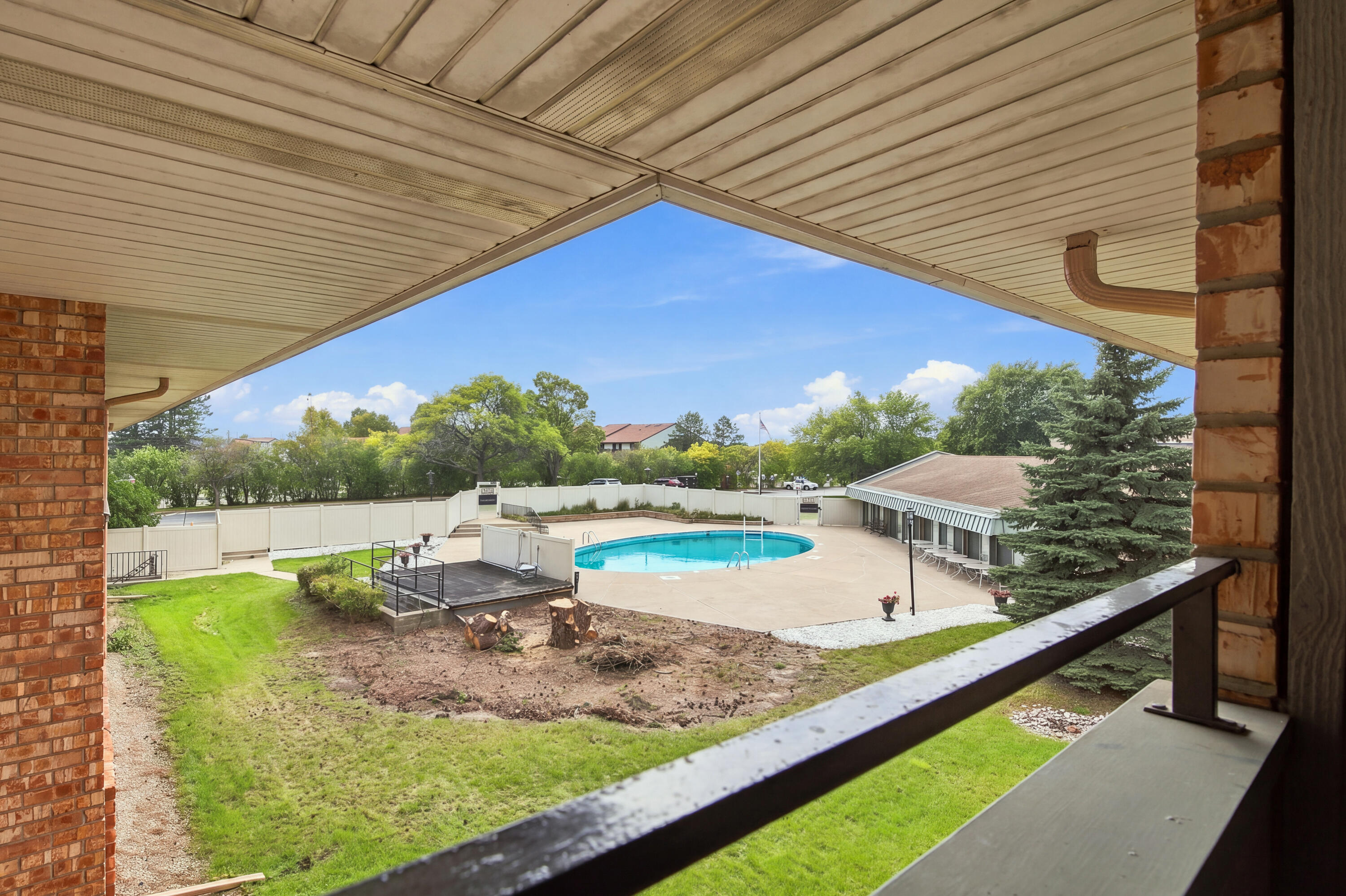 4117 West Rivers Edge Circle, Unit 13 Brown Deer, WI 53209 - Photo 17 of 28 Balcony overlooking pool