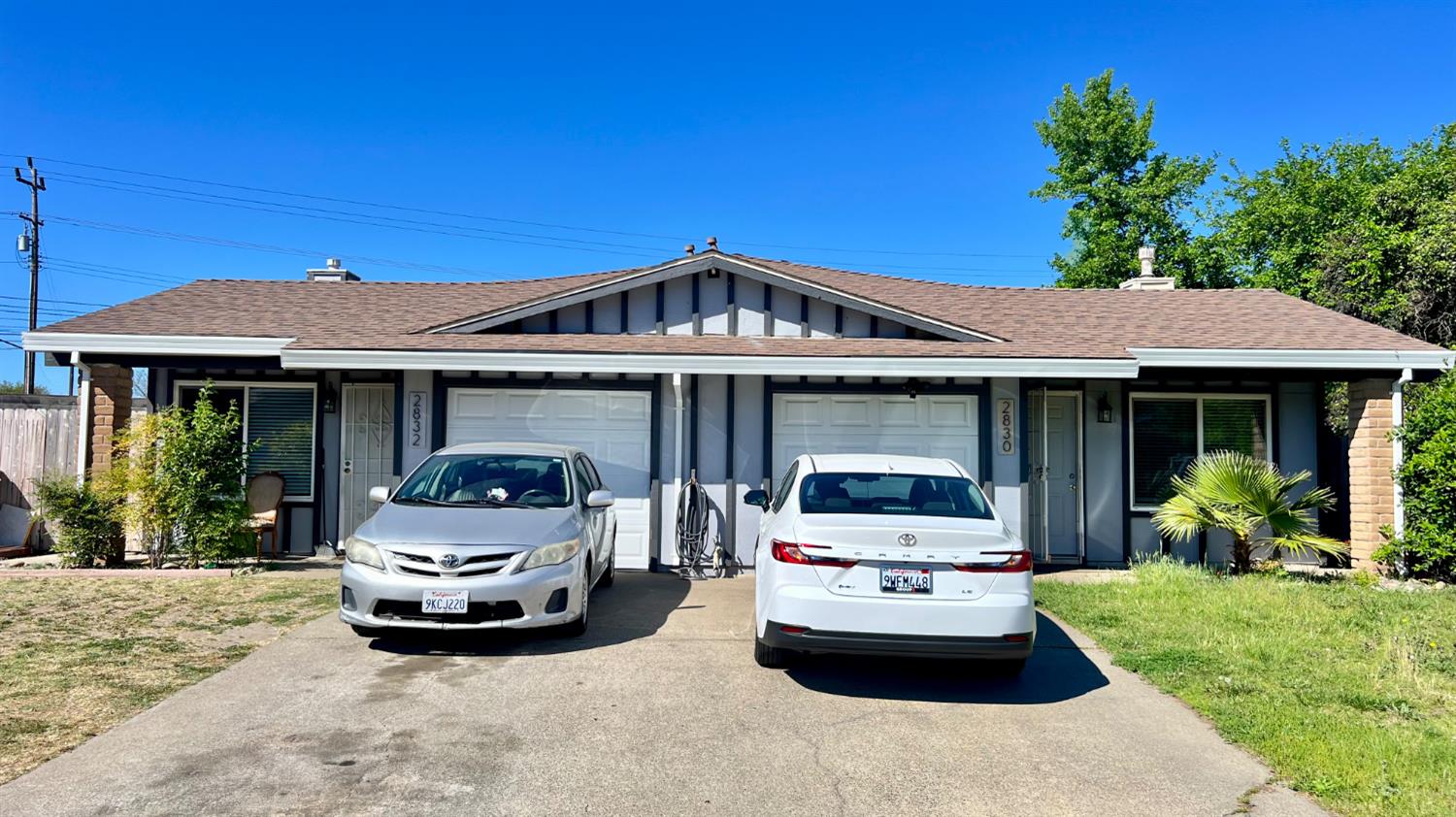 a car parked in front of a house