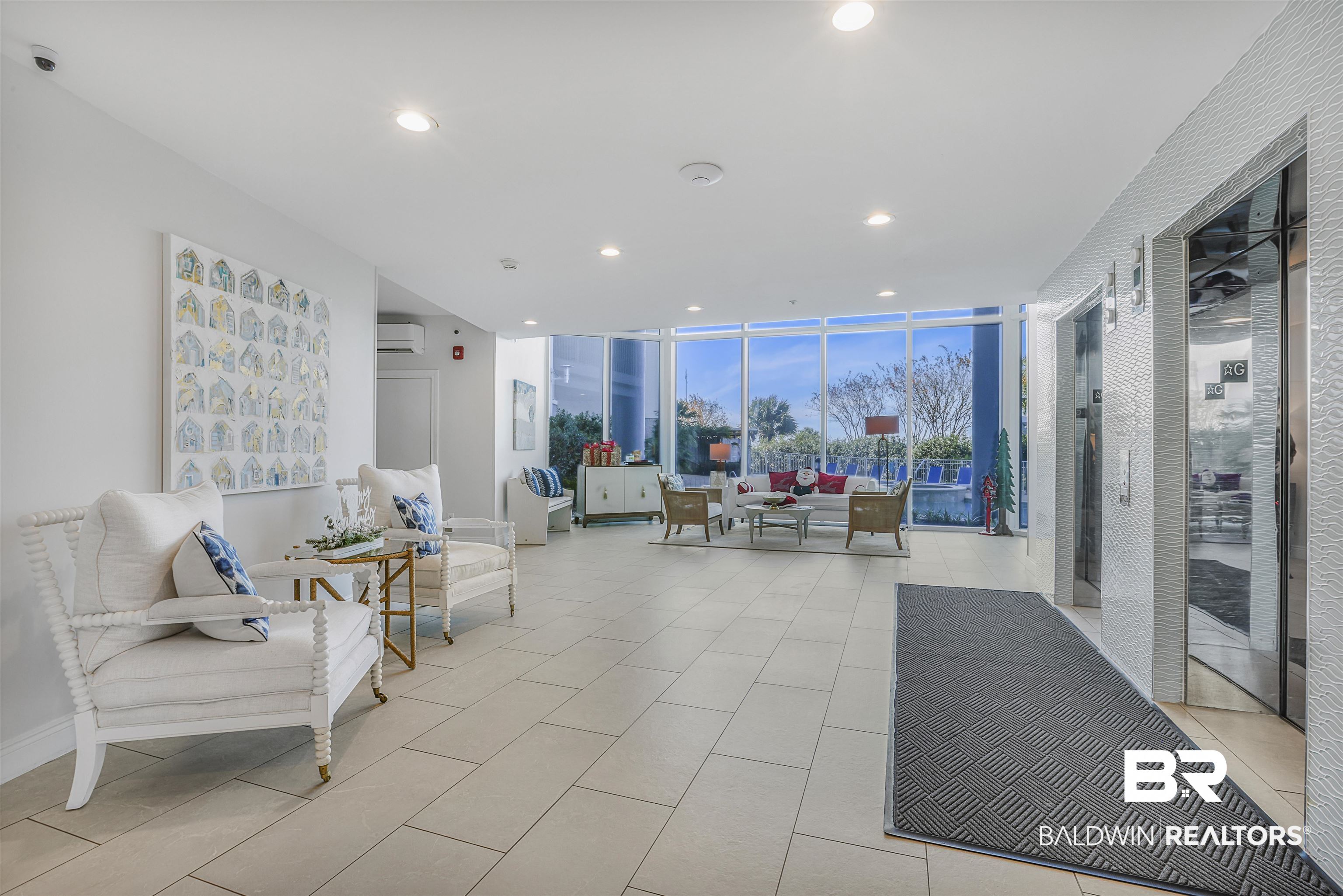 28250 Canal Road, Unit 106 Orange Beach, AL 36561 - Photo 39 of 50 Community lobby with expansive windows and recessed lighting