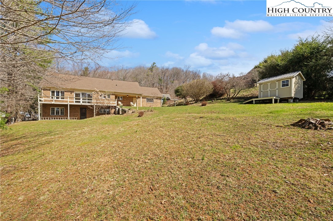 304 Glendale Drive Boone, NC 28607 - Photo 12 of 50 a front view of a house with a yard
