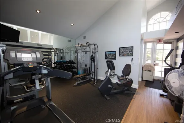 a view of a swimming pool with a yard