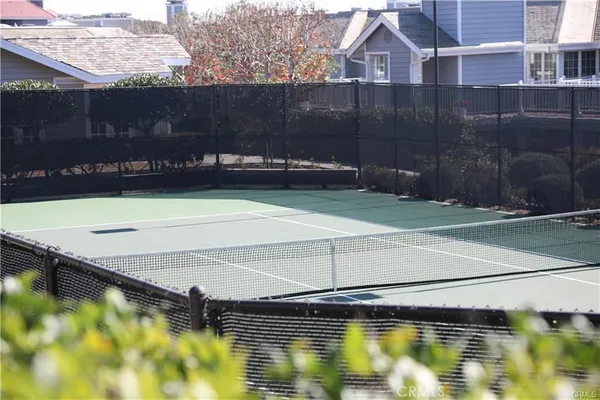 a view of a ocean with a nearby beach