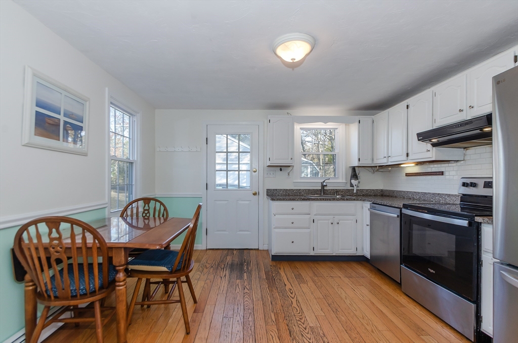 15 Chatham Road Plymouth, MA 02360 - Photo 17 of 35 a kitchen with a table chairs sink and cabinets