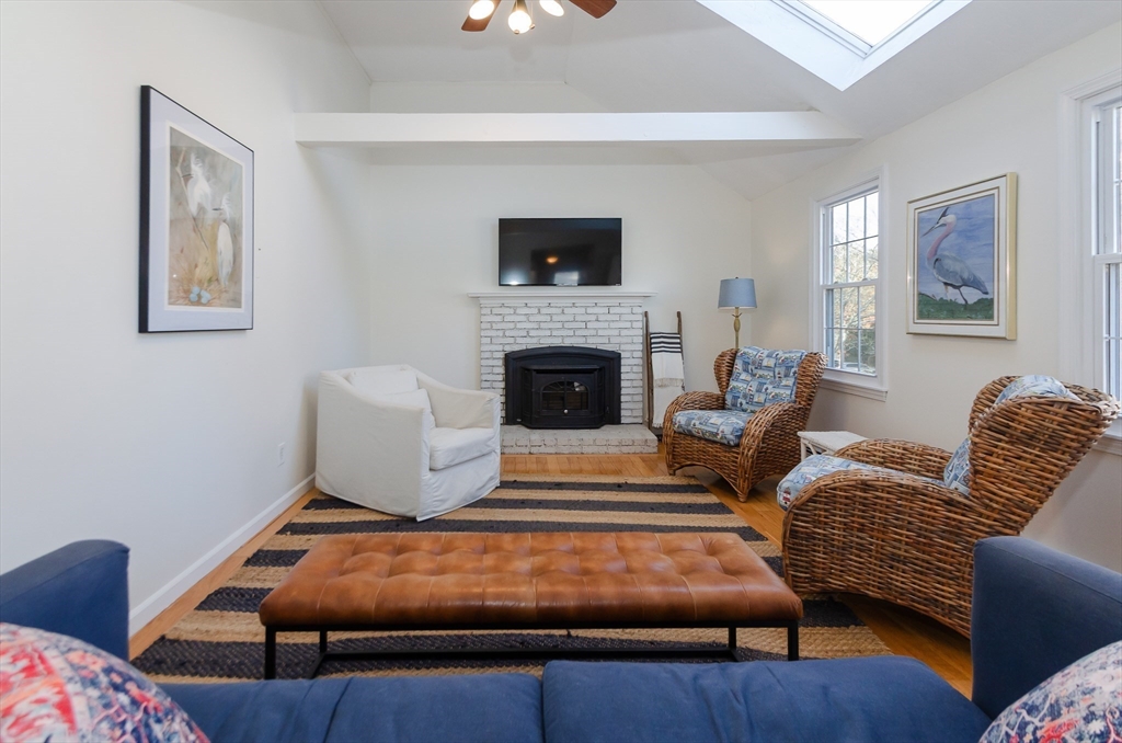 15 Chatham Road Plymouth, MA 02360 - Photo 19 of 35 a living room with furniture and a fireplace