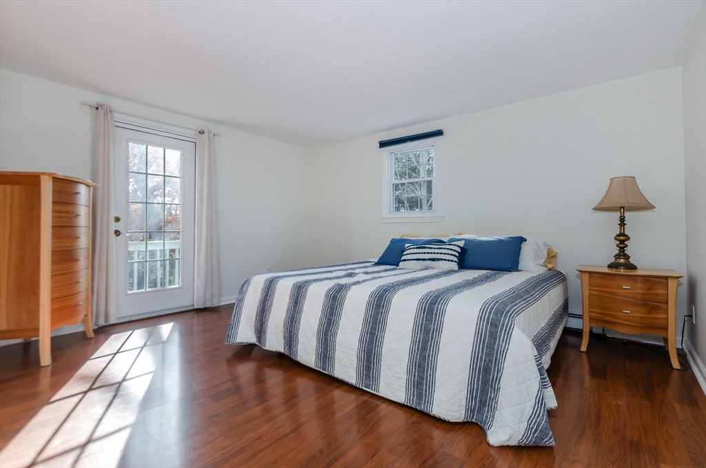 15 Chatham Road Plymouth, MA 02360 - Photo 20 of 35 a bedroom with a bed and wooden floor