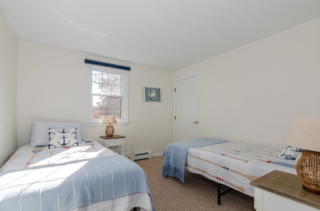 15 Chatham Road Plymouth, MA 02360 - Photo 22 of 35 a bedroom with a bed and window