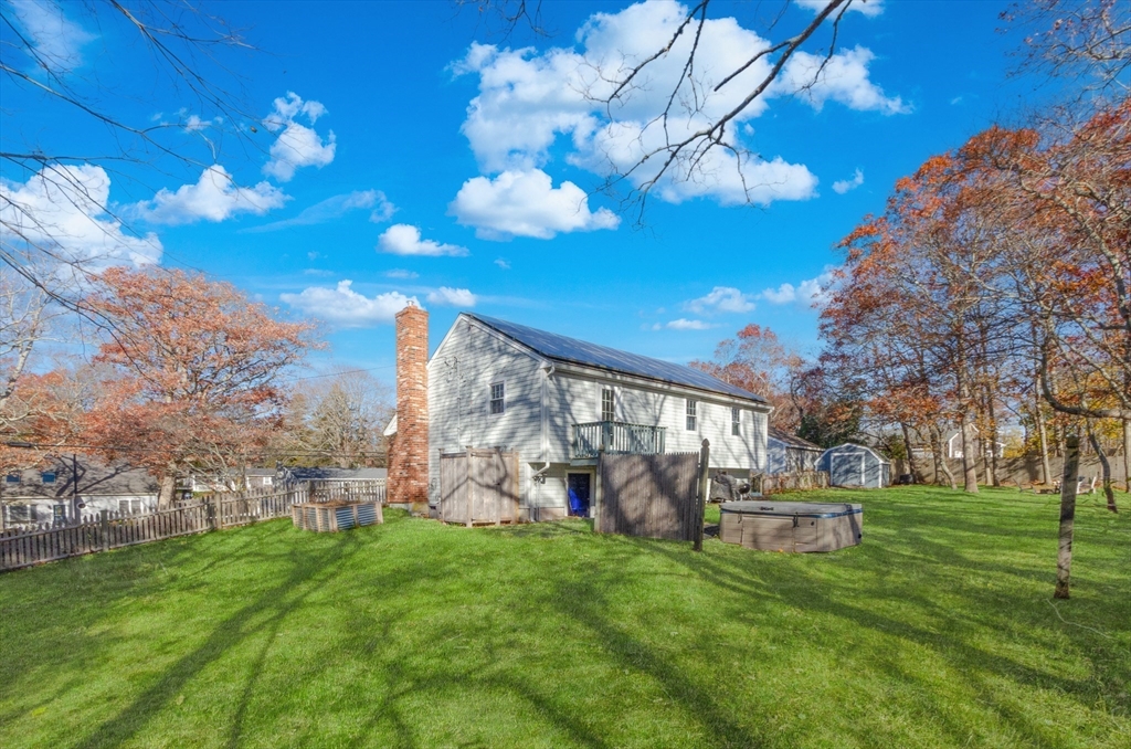 15 Chatham Road Plymouth, MA 02360 - Photo 6 of 35 a view of a house with a backyard porch and sitting area