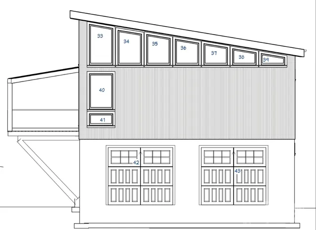 a view of a white house with a view of a swimming pool