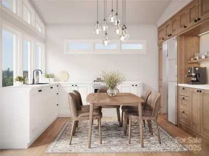 a view of a dining room with furniture