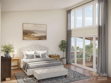 a spacious bedroom with a large bed and a potted plant