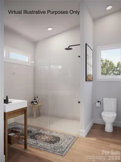 a bathroom with a shower toilet and a sink