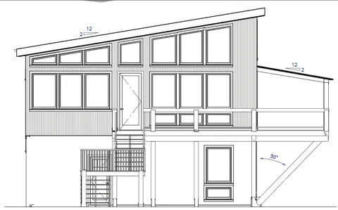 a view of a white house with a balcony