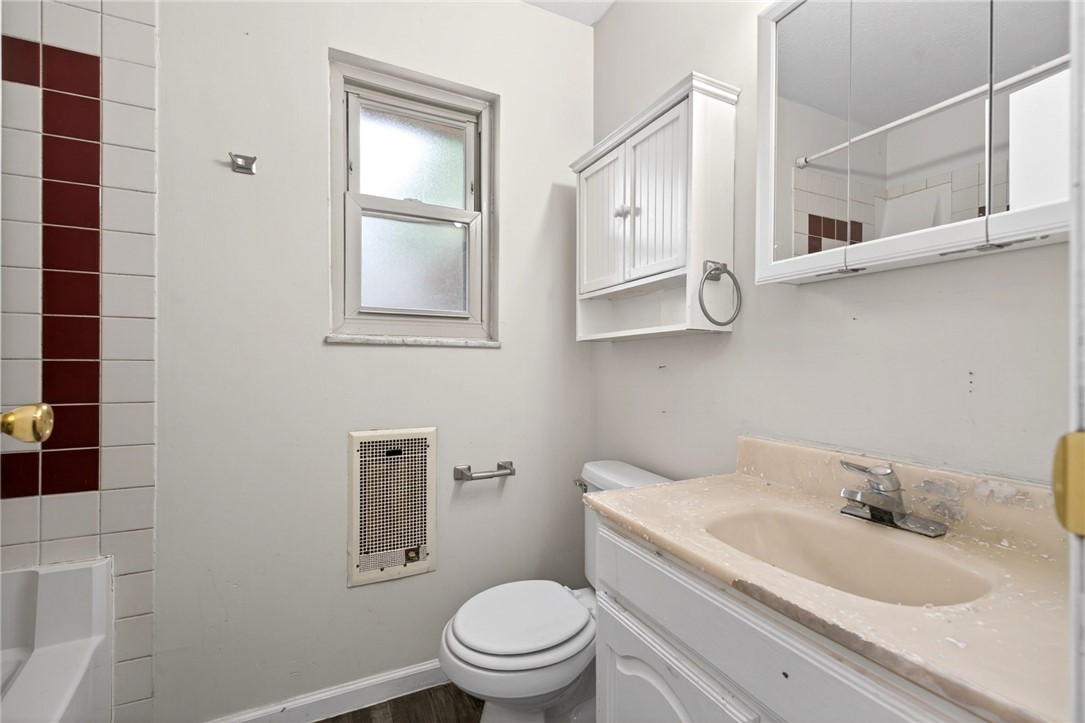 3659 Trail-On Road Dayton, OH 45439 - Photo 23 of 38 This bathroom offers functionality with a window, vanity, and shower, providing practical everyday living.