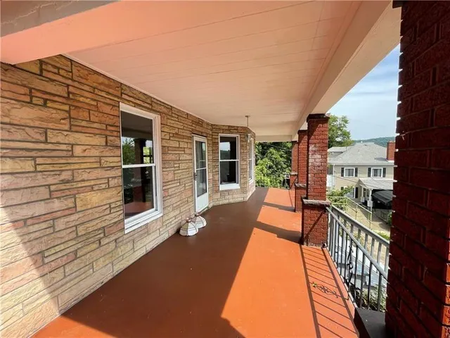 a view of balcony with seating space