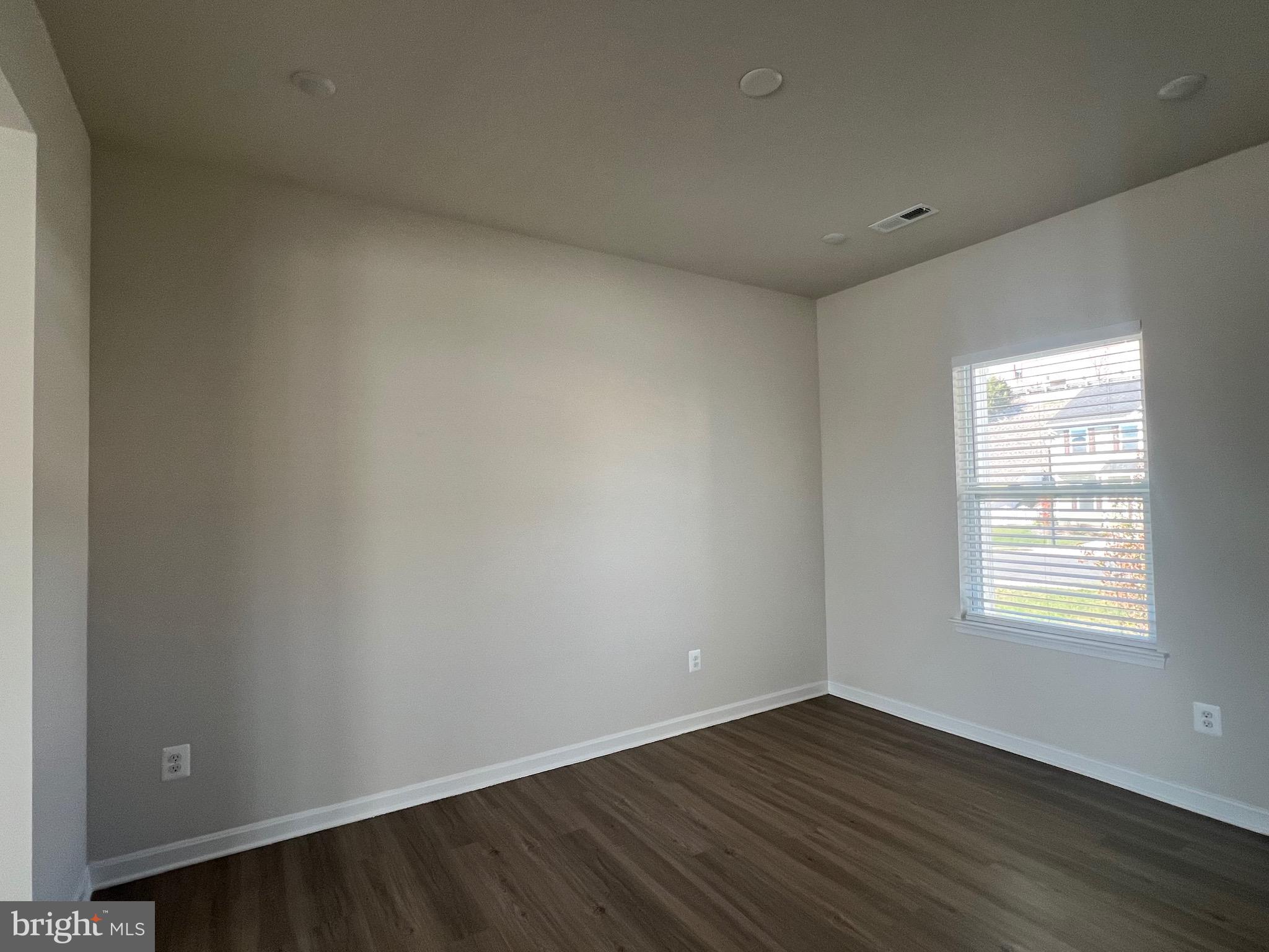 35 Signal Knob Cottage Drive Strasburg, VA 22657 - Photo 12 of 30 an empty room with wooden floor and windows