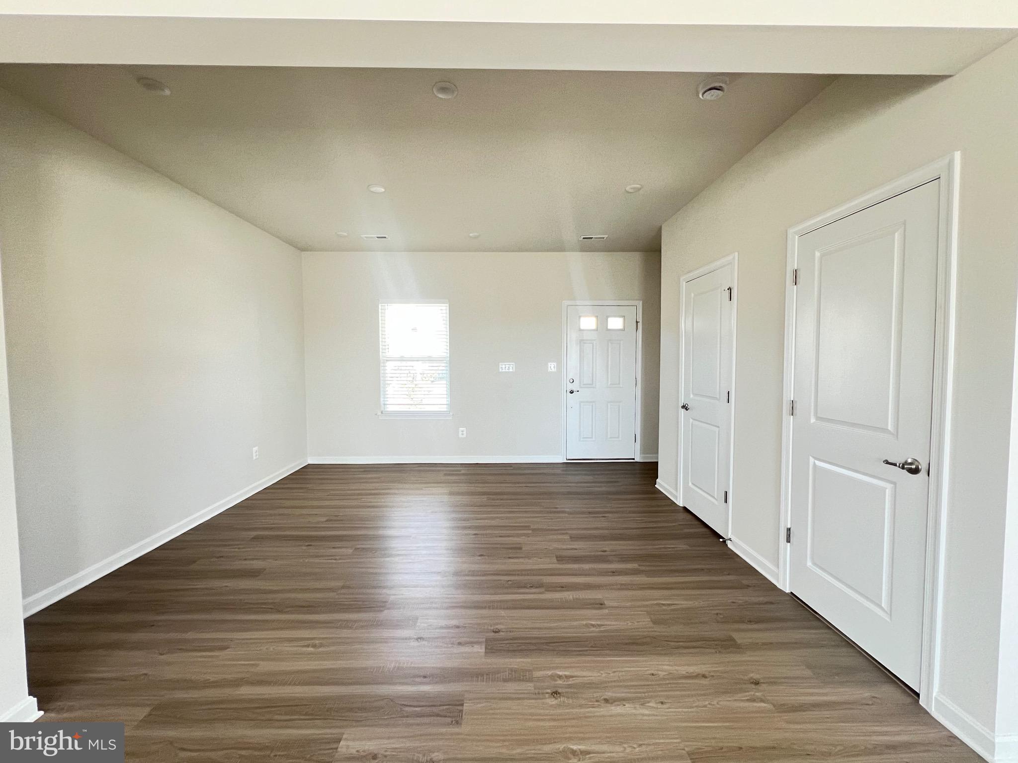 35 Signal Knob Cottage Drive Strasburg, VA 22657 - Photo 13 of 30 a view of an empty room and wooden floor
