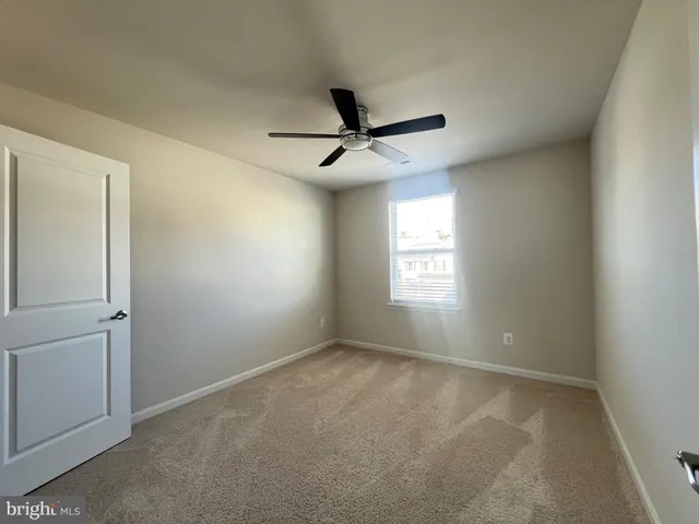 a view of a window in an empty room