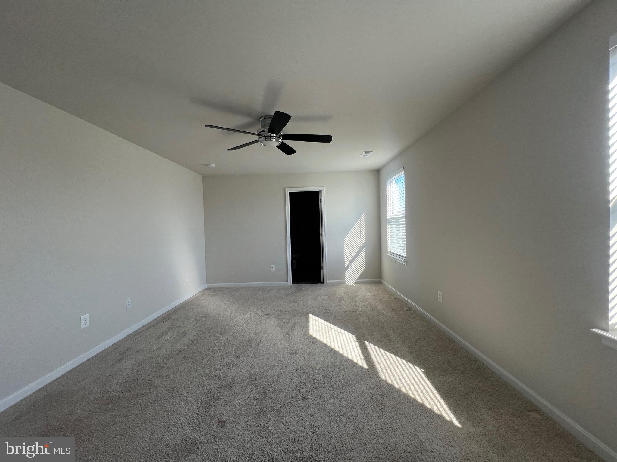 35 Signal Knob Cottage Drive Strasburg, VA 22657 - Photo 19 of 30 a view of a livingroom with a ceiling fan and window