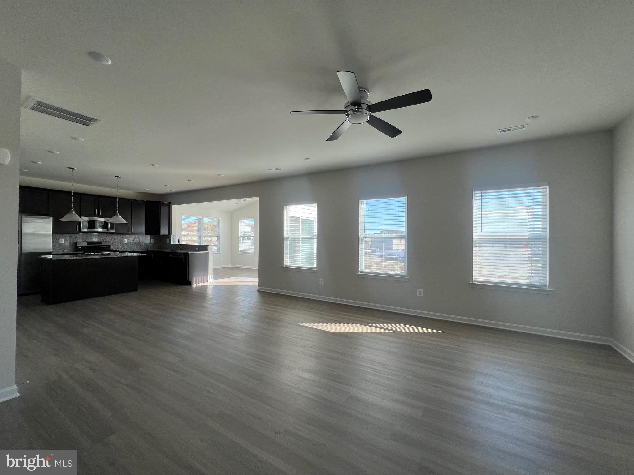 35 Signal Knob Cottage Drive Strasburg, VA 22657 - Photo 3 of 30 a view of a livingroom with furniture hardwood floor and staircase