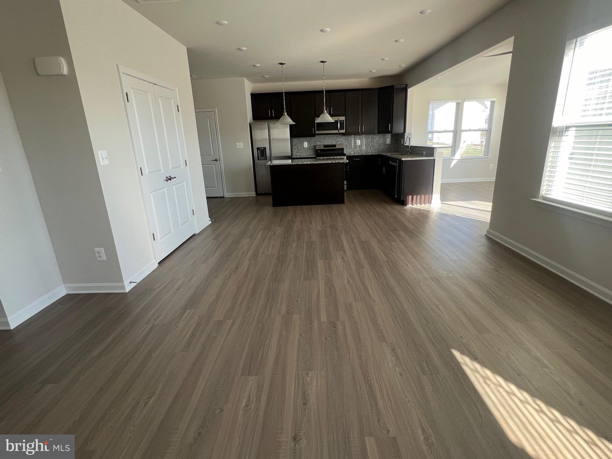 35 Signal Knob Cottage Drive Strasburg, VA 22657 - Photo 6 of 30 a view of kitchen with sink microwave refrigerator and stove