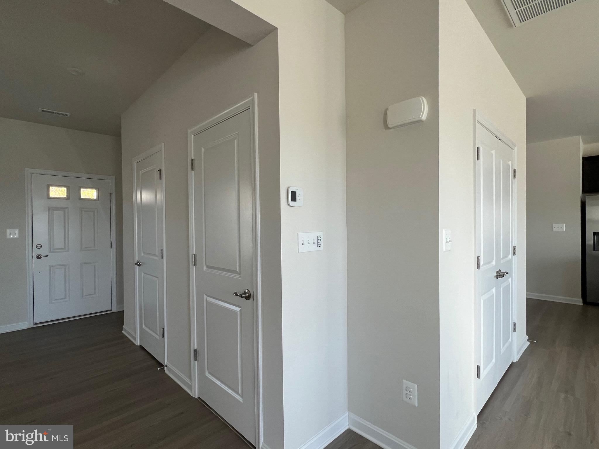 35 Signal Knob Cottage Drive Strasburg, VA 22657 - Photo 8 of 30 a view of a hallway with wooden floor