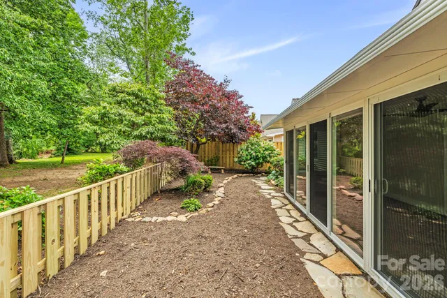 a view of a pathway with a balcony