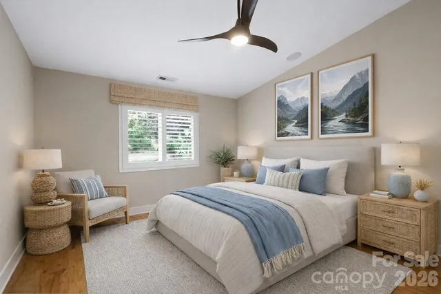 a bedroom with bed and a window