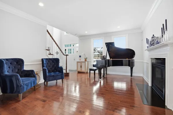 a kitchen with stainless steel appliances granite countertop a sink and dishwasher a stove top oven with white cabinets