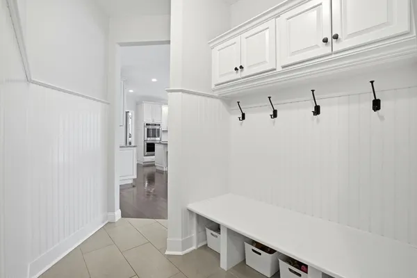 a view of a hallway with windows