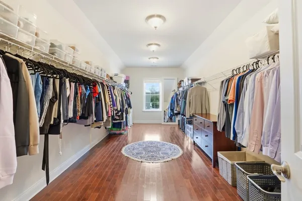 an entryway and livingroom with furniture