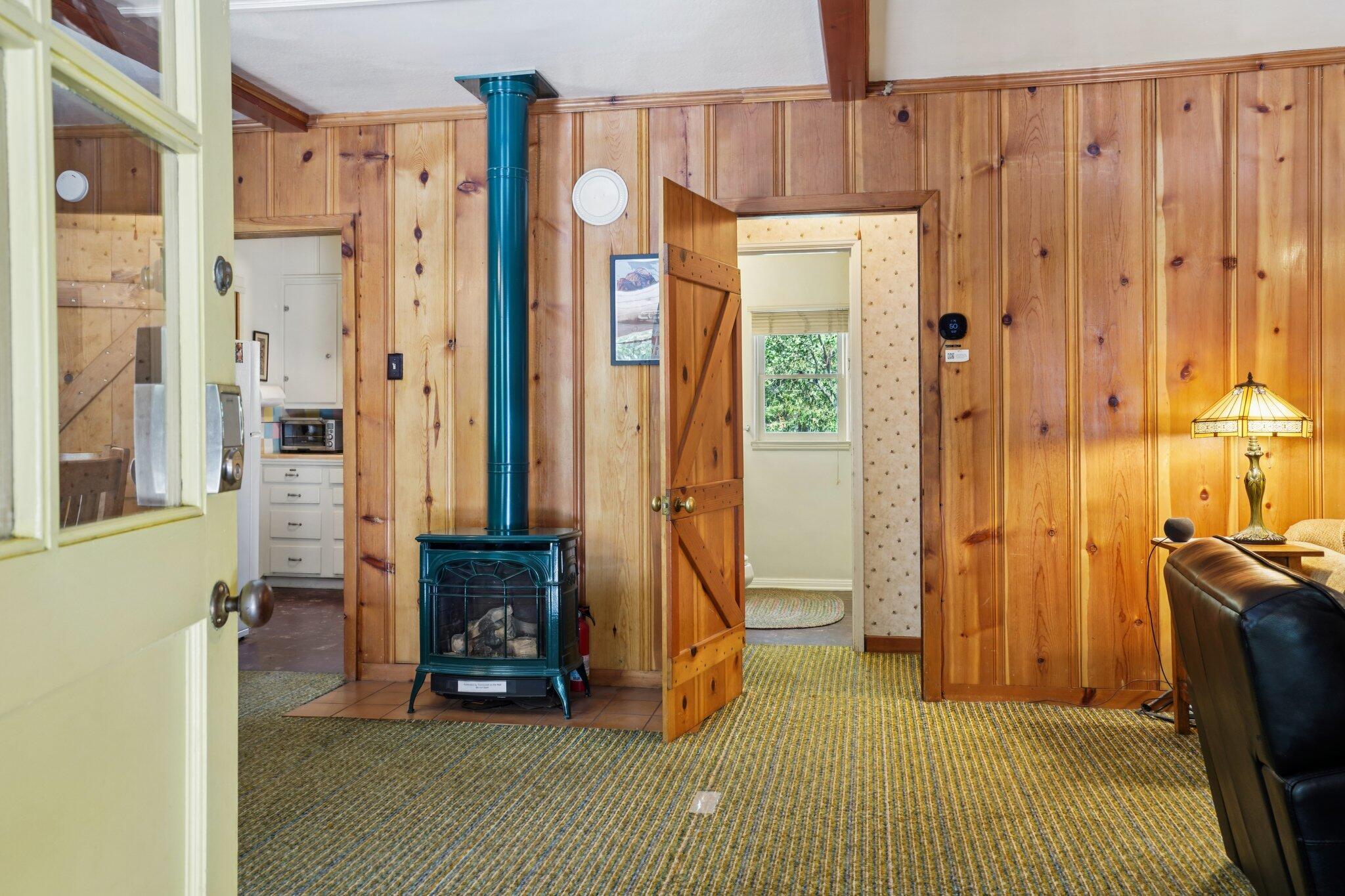 55280 Circle Way Idyllwild, CA 92549 - Photo 3 of 27 a bedroom with a bed and a refrigerator