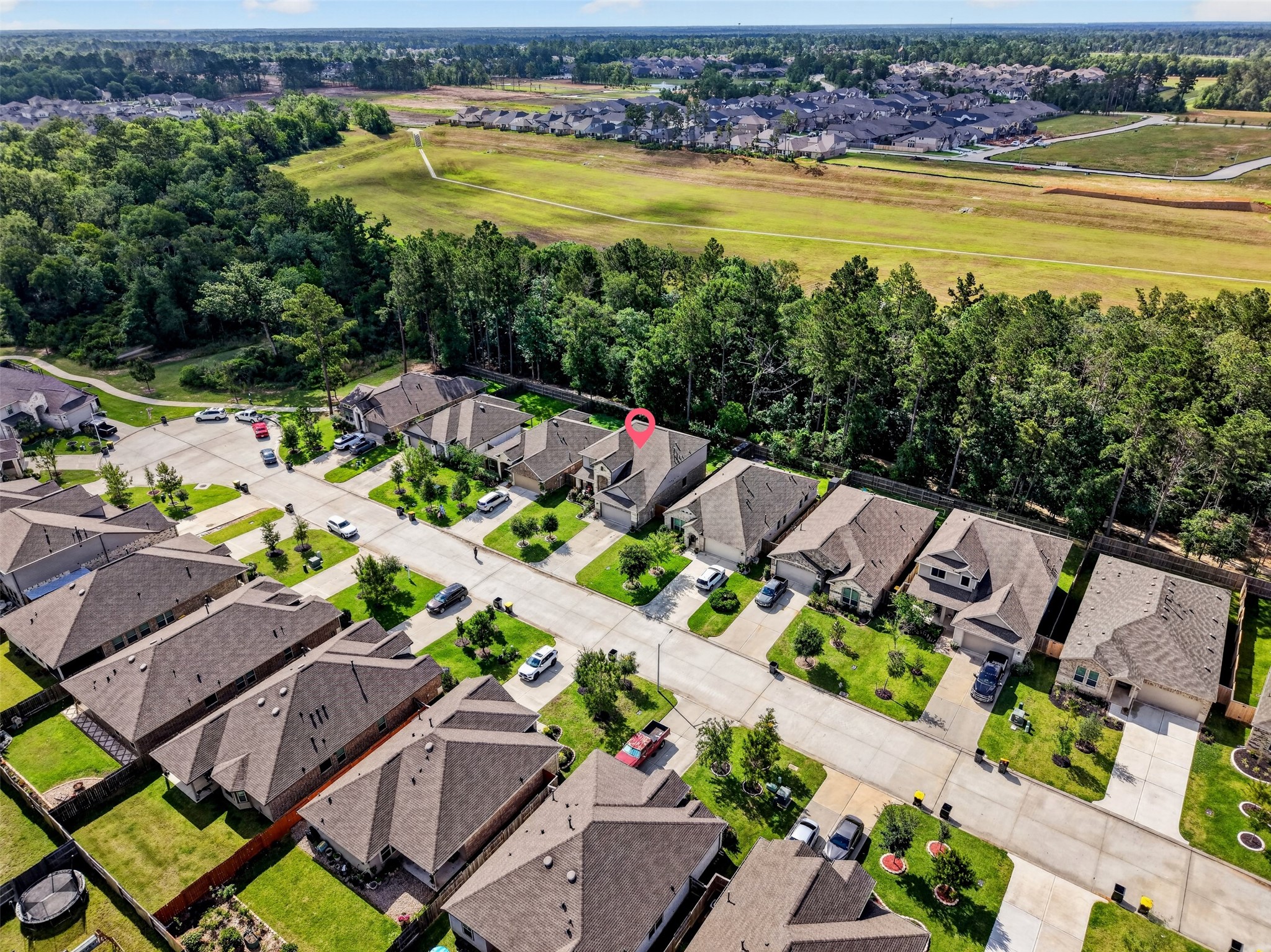 2832 Mistygate Court Conroe, TX 77301 - Photo 45 of 50 Aerial neighborhood view showing the home location within the community.
