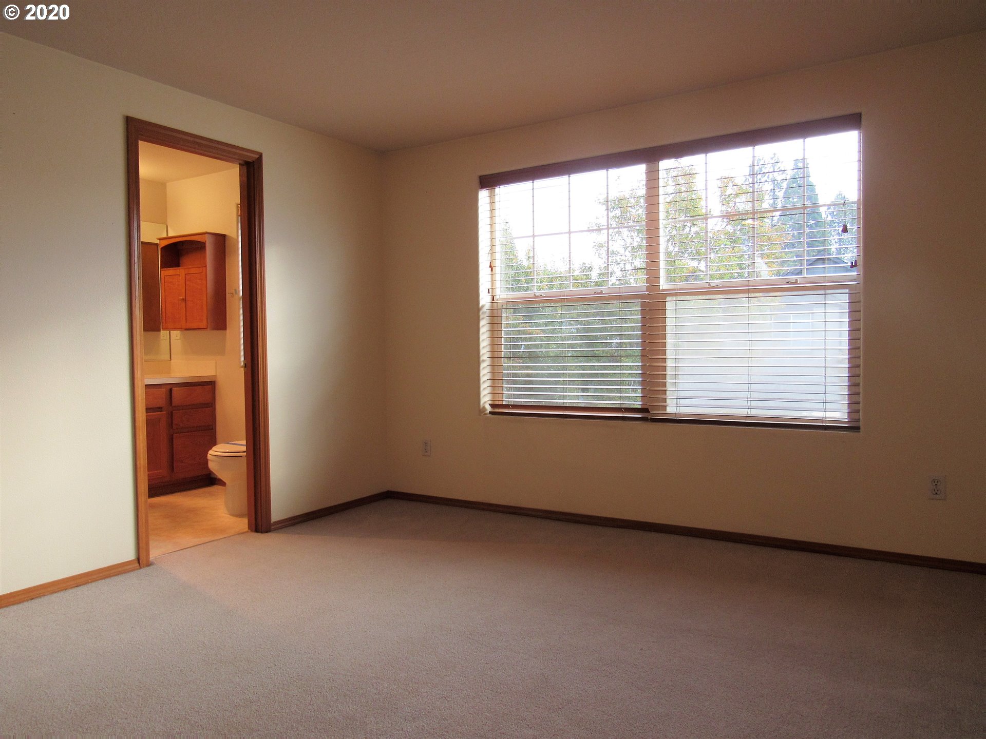1244 Southwest 160th Avenue, Unit 101 Beaverton, OR 97006 - Photo 14 of 24 an empty room with windows