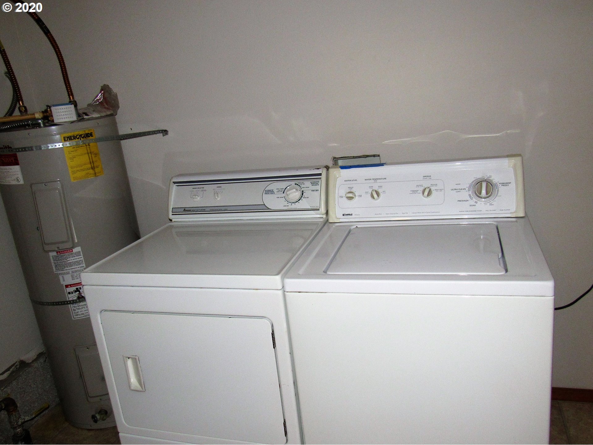 1244 Southwest 160th Avenue, Unit 101 Beaverton, OR 97006 - Photo 22 of 24 a utility room with dryer and washer