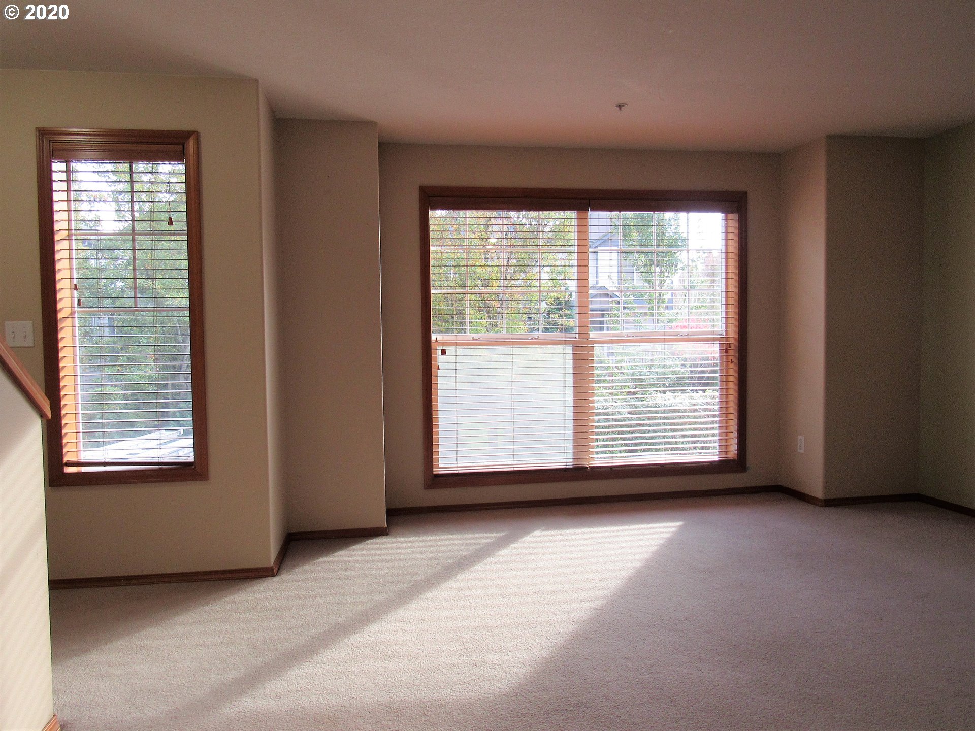 1244 Southwest 160th Avenue, Unit 101 Beaverton, OR 97006 - Photo 8 of 24 a view of an empty room with a window