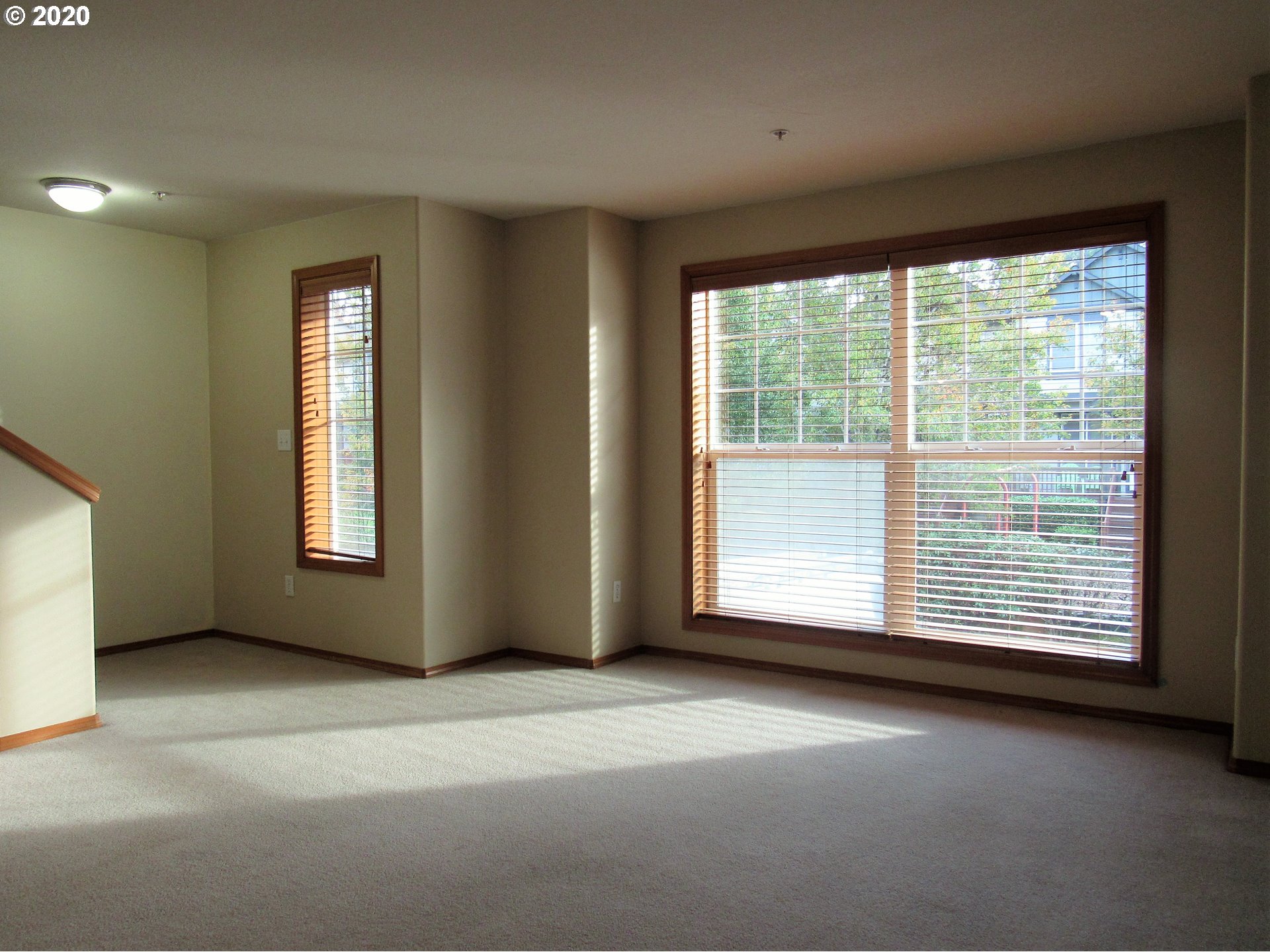 1244 Southwest 160th Avenue, Unit 101 Beaverton, OR 97006 - Photo 9 of 24 a view of an empty room with a window