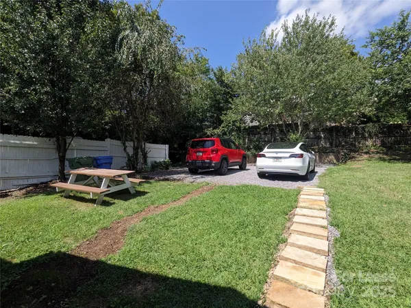 a house view with a garden space