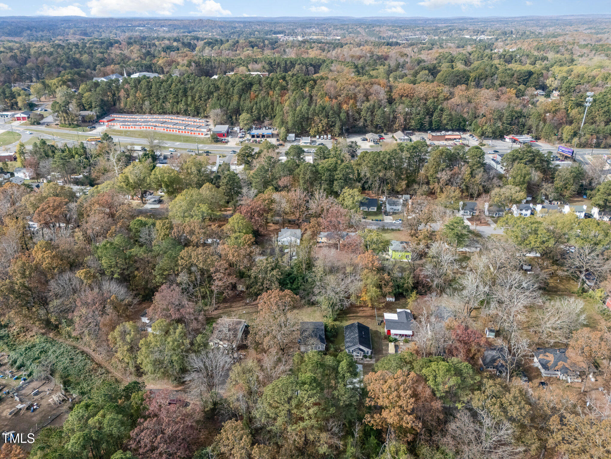 4505 Laymans Chapel Road Durham, NC 27704 - Photo 18 of 20 an aerial view of mountains with green space and fog