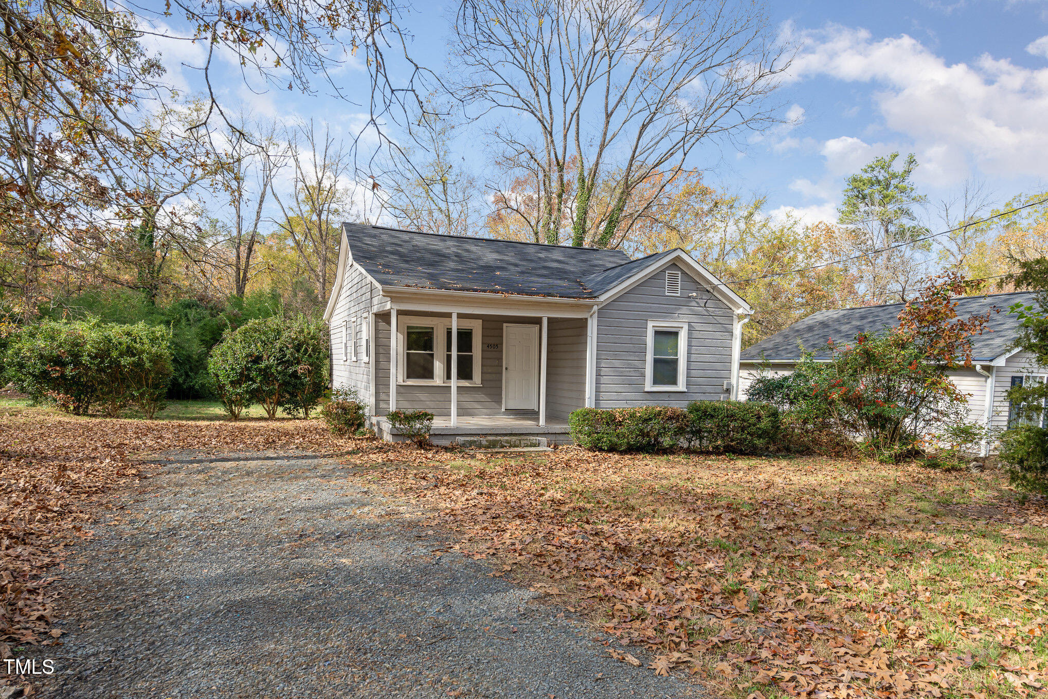 4505 Laymans Chapel Road Durham, NC 27704 - Photo 19 of 20 a front view of a house with a yard