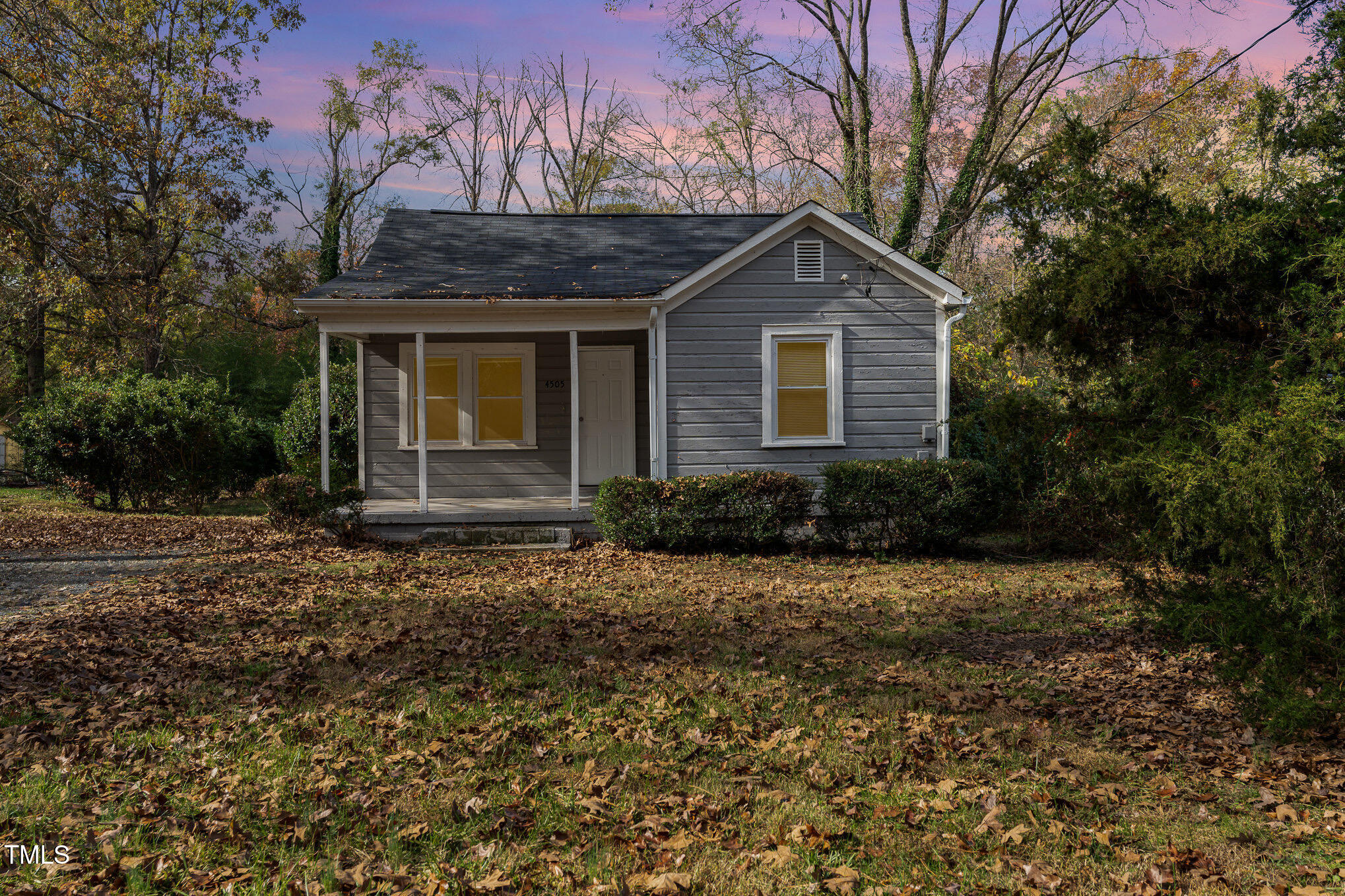 4505 Laymans Chapel Road Durham, NC 27704 - Photo 2 of 20 a front view of a house with garden