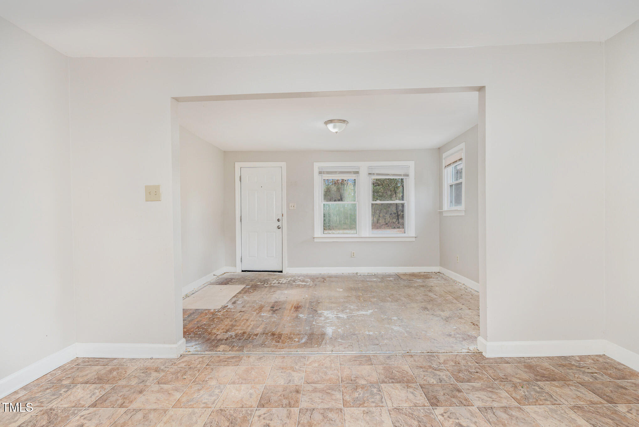 4505 Laymans Chapel Road Durham, NC 27704 - Photo 4 of 20 a view of an empty room with window