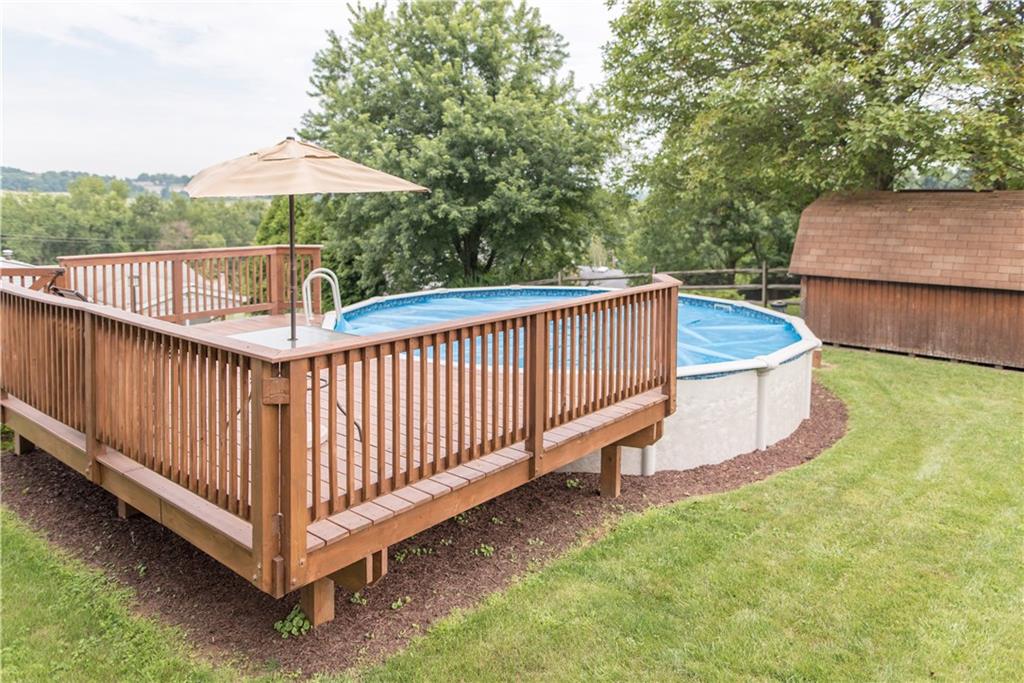 364 Lincoln Hall Road Elizabeth, PA 15037 - Photo 16 of 19 New deck added to the pool. Large storage shed is included.