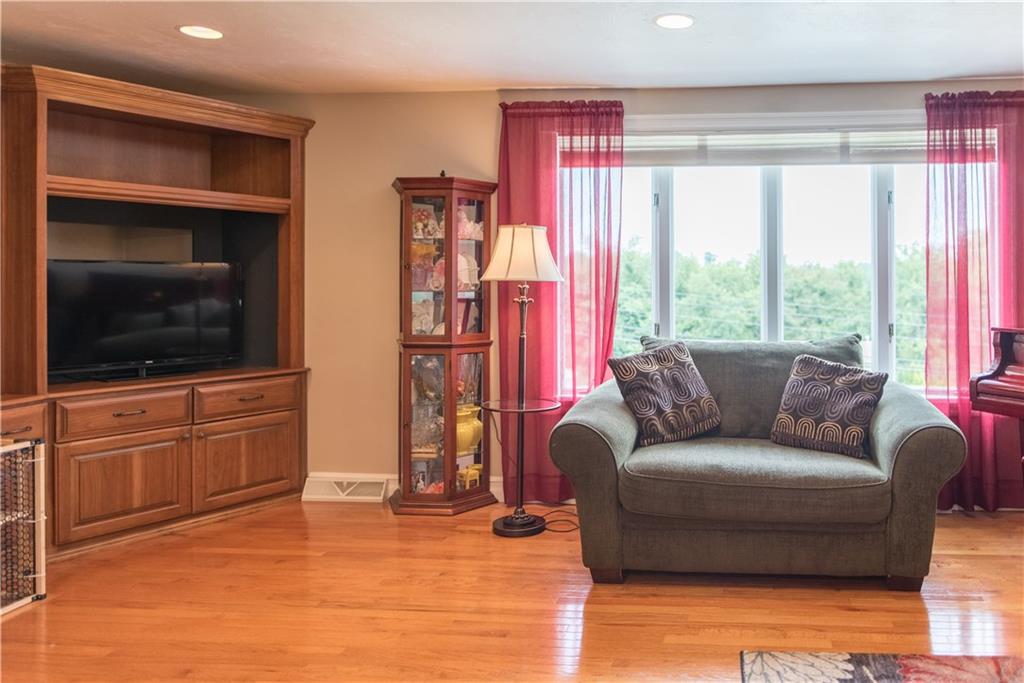 364 Lincoln Hall Road Elizabeth, PA 15037 - Photo 3 of 19 Look at the gorgeous natural light shining in the large front window. Recessed lighting in the living room as well as the kitchen area. Beautiful built in corner entertainment unit is included with the sale.