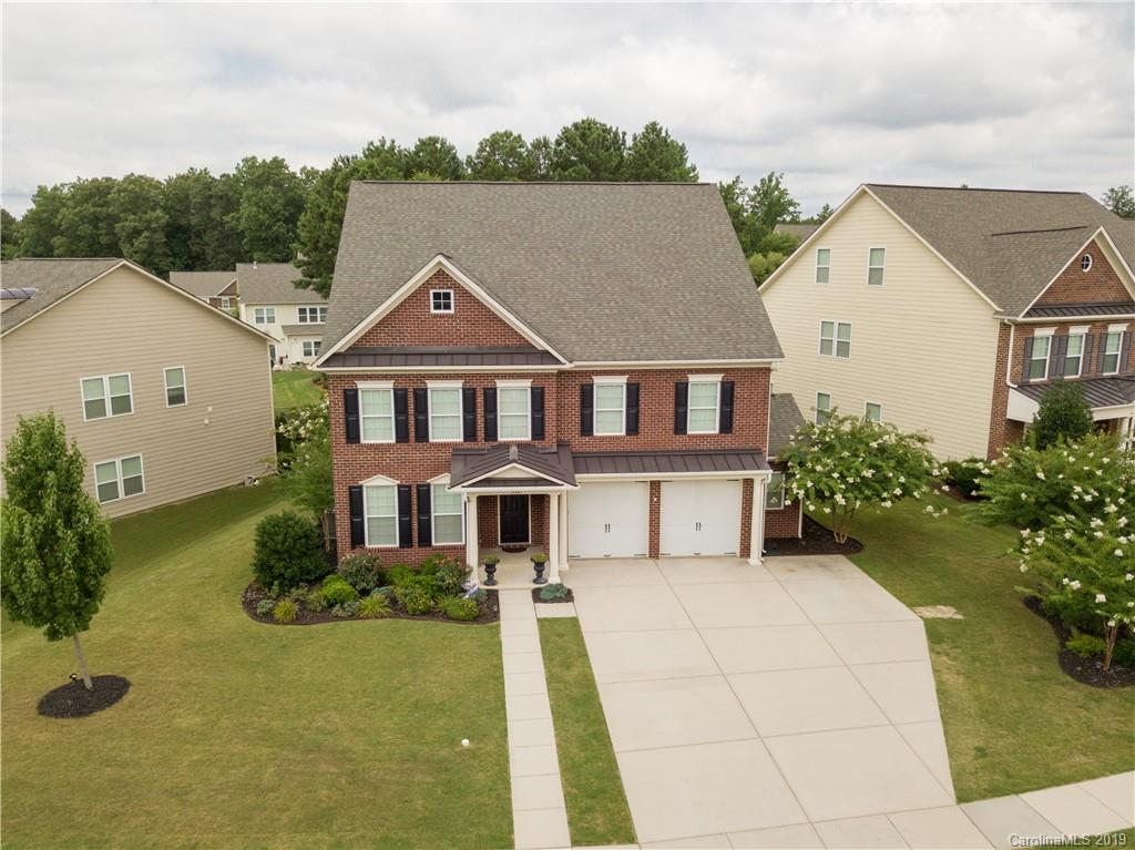 3347 Mandrake Court Tega Cay, SC 29708 - Photo 1 of 27 a house that has a lot of plants in it