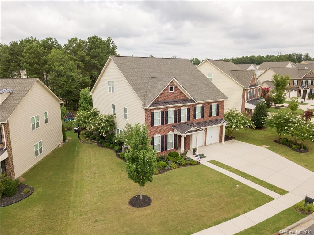 3347 Mandrake Court Tega Cay, SC 29708 - Photo 2 of 27 a view of a white house with a outdoor space