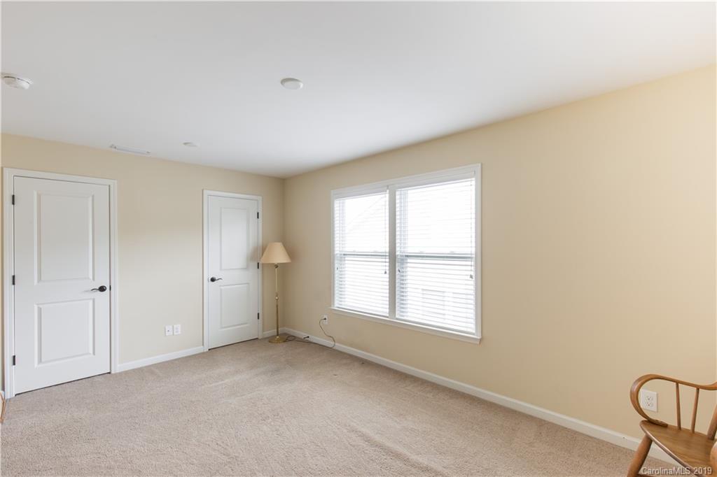 3347 Mandrake Court Tega Cay, SC 29708 - Photo 22 of 27 a view of an empty room with a window