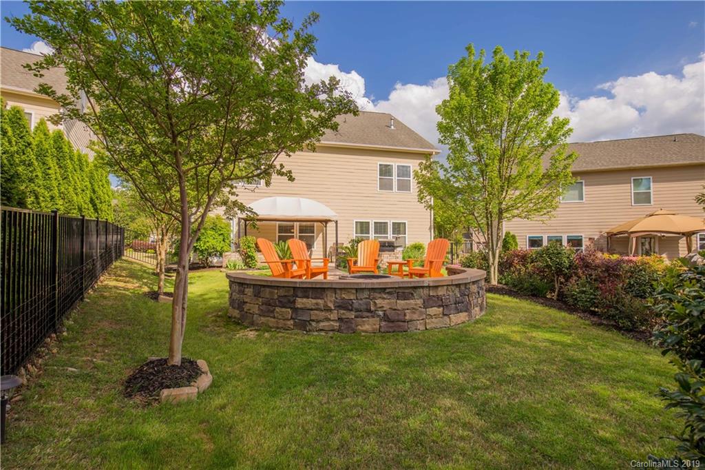 3347 Mandrake Court Tega Cay, SC 29708 - Photo 24 of 27 a front view of a house with a garden