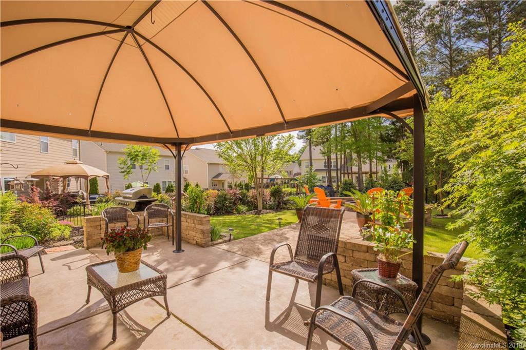 3347 Mandrake Court Tega Cay, SC 29708 - Photo 25 of 27 a view of an outdoor sitting area with a backyard
