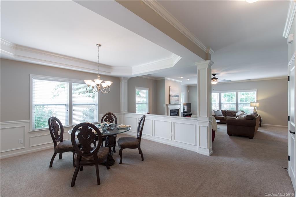 3347 Mandrake Court Tega Cay, SC 29708 - Photo 6 of 27 a view of a dining room with furniture window and outside view